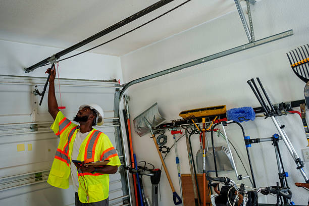 Professional Garage Door Roller Replacement technician working in Oakes, ND